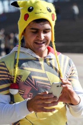 A Pokemon Go fans in Sydney on Sunday.