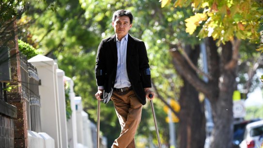 Christopher Tia of Annandale contracted polio in Laos when the vaccine ran out. His two brothers received treatment; he did not.