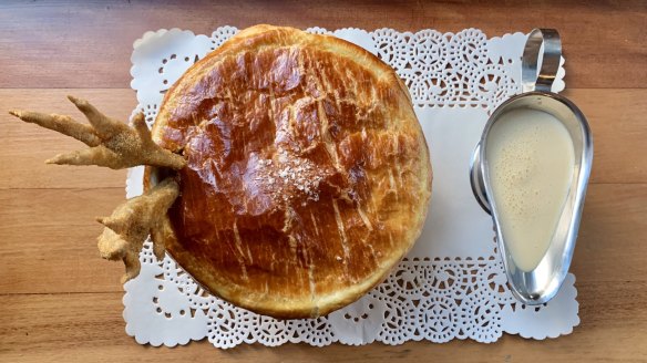 Roasted chicken and artichoke pie with chicken fat and yellow wine sauce.