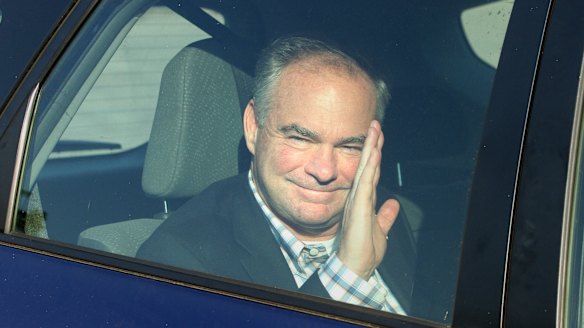 Virginia Senator Tim Kaine waves to the crowd before attending a private fundraiser event in Newport, Rhode Island, hosted by fellow Democratic Senator Jack Reed.