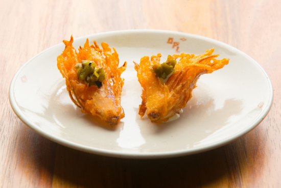 Like a bloomin' onion in miniature: fried shallot with jalapeno cashew sour cream