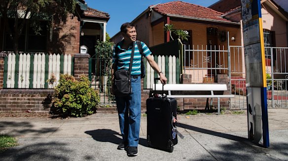 Canadian David waiting for the bus to Sydney Airport at Banksia train station.