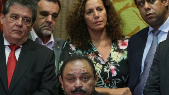 The acting speaker of the lower house of Brazil's Congress Waldir Maranhao, centre, annulled last month's vote.