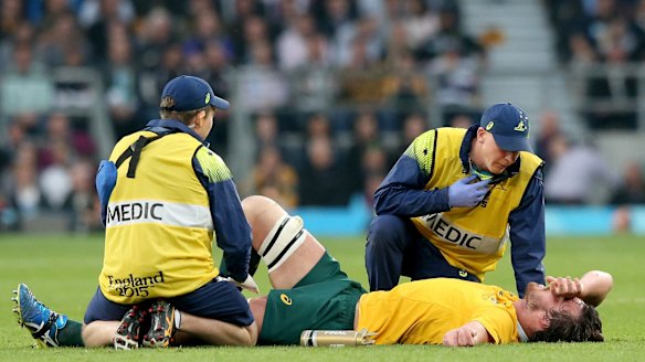 Wallaby down: Kane Douglas is treated for injury during the 2015 Rugby World Cup Final.