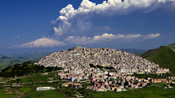 Hot picks: Gangi, Sicily, with Mount Etna erupting in the background.