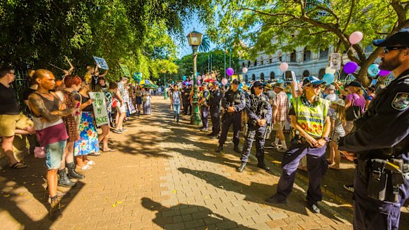 Police separated pro-life and pro-choice demonstrators outside Parliament House.