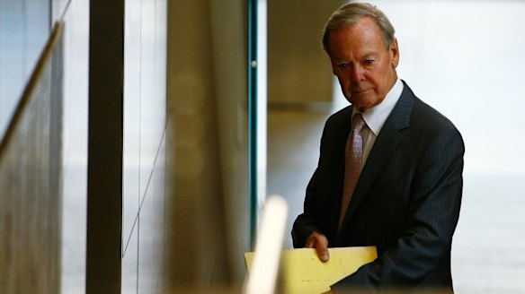 Former Knox Grammar headmaster Ian Paterson leaves the royal commission after giving evidence on Friday.