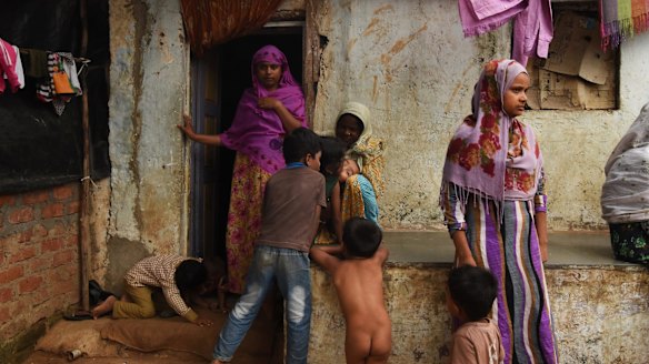 Women and children at a camp  for 71 Rohingya families in India. 