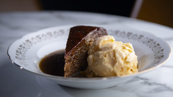 Sticky date pudding swathed in sweet golden caramel sauce and homemade vanilla bean ice-cream.
