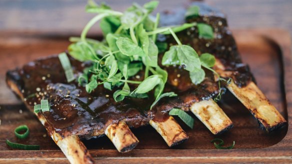 Half rack of slow-cooked pork ribs.