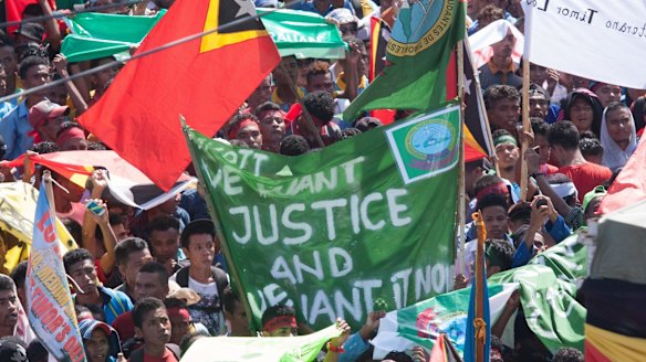 Protesters in Dili last month demanded that Australia negotiate over the Timor Sea boundary.
