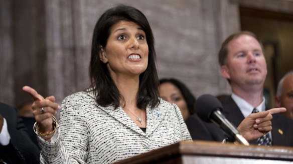 South Carolina Governor Nikki Haley speaks during a ceremony where she signed a bill to remove the Confederate flag from the Statehouse grounds more than 50 years after the rebel banner was raised to protest the civil rights movement. 