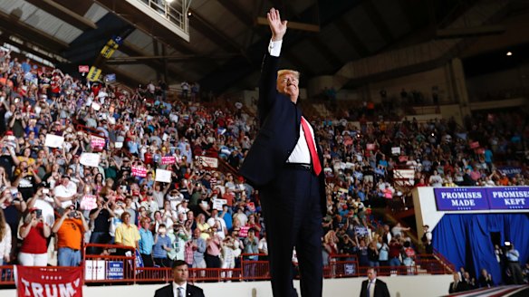 Donald Trump arrives to speak at the Pennsylvania Farm Show Complex and Expo Center in Harrisburg, Pennsylvania.