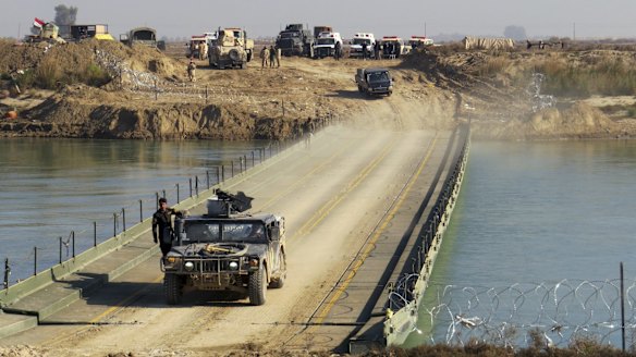 Iraqi forces cross the Euphrates in the advance to Ramadi.