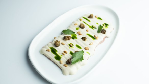 Chiosco's signature vitello tonnato, slow-cooked veal, tuna mayonnaise,
fried capers, parsley oil. 