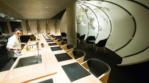 The dining room features a floor-to-ceiling lantern.