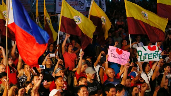 Supporters of President Rodrigo Duterte at Manila's Rizal Park for a vigil to show their backing for the president's so-called war on drugs.