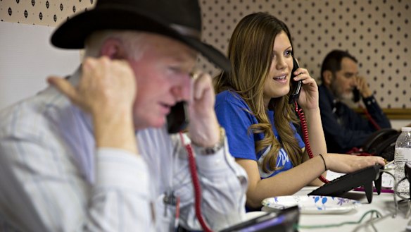 Volunteers make phone calls at a campaign office for Senator Ted Cruz in Waukesha, Wisconsin.