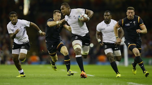 Fiji's Leone Nakarawa makes a break against Wales.