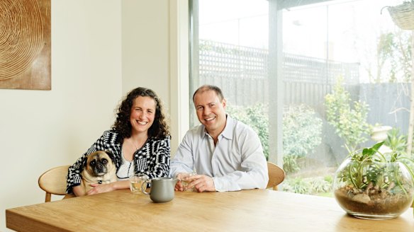 At home with wife Amie and dog Fonzi.