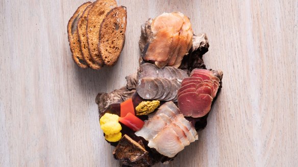 Housemade meat and seafood charcuterie selection.