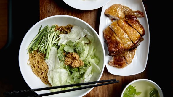 Crispy-skin chicken, noodles, soup and fresh herbs at Tan Viet in Cabramatta.