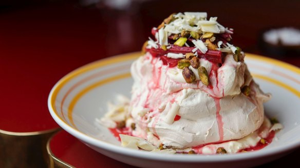 White chocolate and pistachio pavlova, rhubarb and yogurt cream.