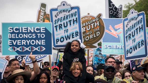 Demonstrators participate in the March for Science in Washington.
