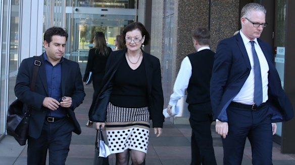 Journalists Linton Besser, Kate McClymont and Sean Nicholls outside the Supreme Court.