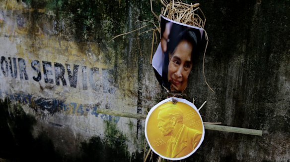 An effigy of Myanmar's State Counsellor Aung San Suu Kyi is placed against a wall before it was burnt by activists of an ultra-leftist organisation in Kolkata, India.
