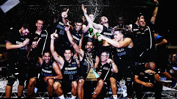 Champions: The NZ Breakers celebrate after winning the NBL Grand Final series in March.