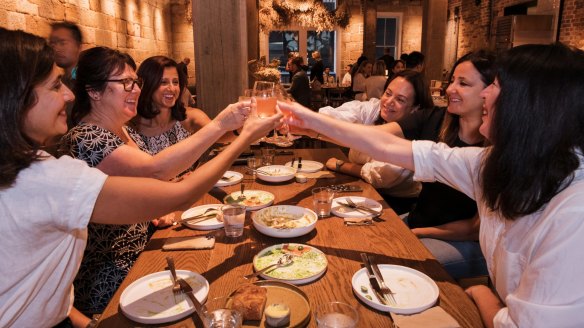 Friends catch up after work on Thursday night at Grana in the CBD's new Quay Quarter precinct. 