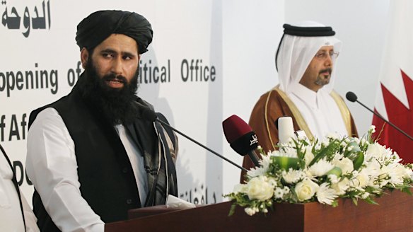 Muhammad Naeem, left, a spokesman for the Taliban, at the opening of the Taliban  political office in the Qatari capital Doha in June 2013, part of the fitful process of "talks about talks".
