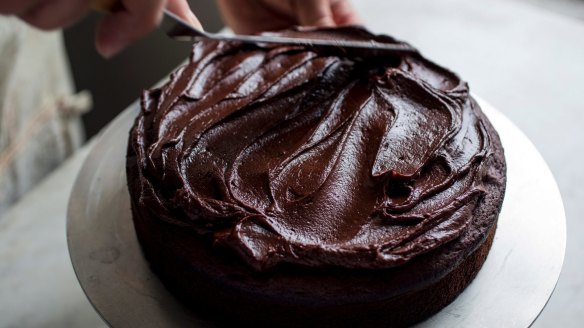 You can pour the warm ganache straight over the cake, or let it thicken to a spreadable consistency (pictured).