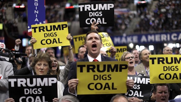 West Virginia delegates at the Republican convention in July show their support for Trump. 
