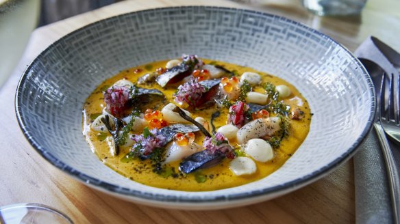 Conchas y caballa - sliced scallops and blue mackerel in aji amarillo, topped with salmon roe and seaweed.