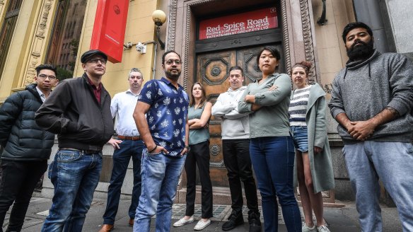 Former employees from Red Spice road who are owed wages from the restaurant, pictured in February. L-R Anthony, William, James, Varun, Laura, Christian, Sungeun, Kasey and Anup.