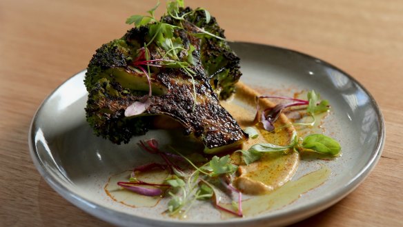 Char-grilled broccoli on eggplant puree.