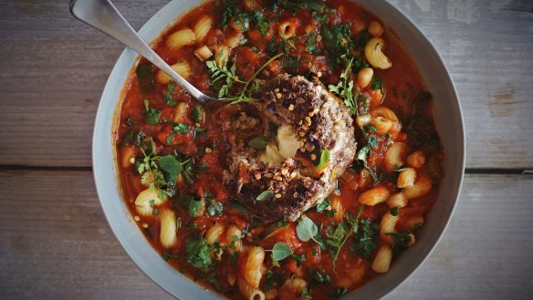 Minestrone with cheese-stuffed meatball.