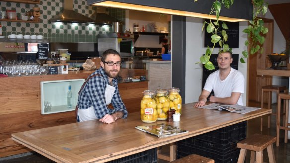 Hugh Whitehead and Chris Welsh of Geelong's  Little Green Corner. The cafe's plastics-free efforts include having milk delivered in metal pails.  