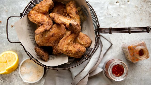 Buttermilk fried chicken with hot sauce.