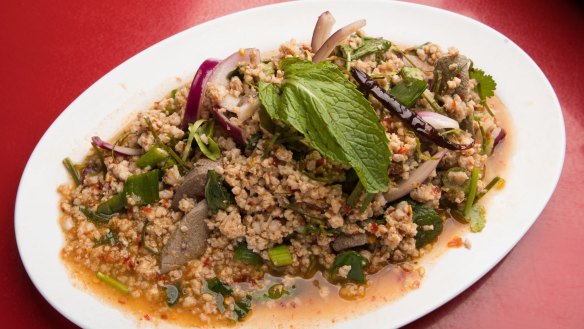 Pork larb, the classic Thai warm salad of mince razzed with lime and fish sauce.
