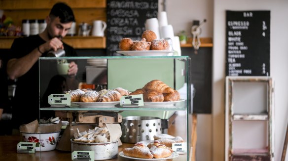 Carlo Mellini says running the Cannoli Bar doesn't feel like work.