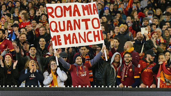 Roma fans show their support, with a banner that reads: 'Oh Rome of mine, I miss you so'.