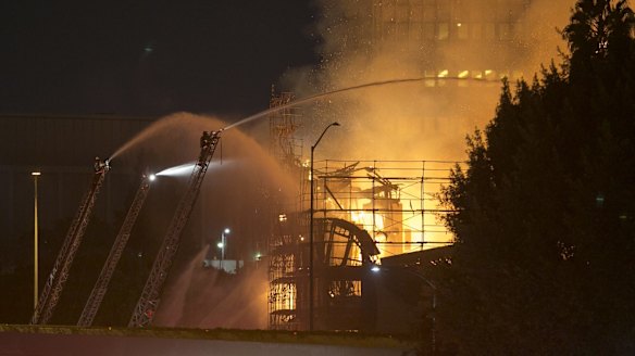 Massive fire closes freeways in downtown Los Angeles