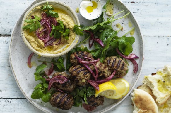 Neil Perry's lamb meatballs with onion salad and hummus.