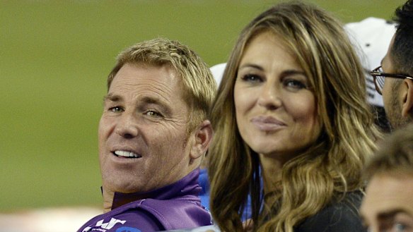 Shane Warne with Elizabeth Hurley during a cricket promotional tour in Los Angeles in November 2014.