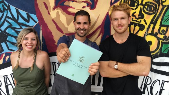 Caity Reynolds, Jerome Felix and Jordan Montgomery with the new The Cupping Room cookbook.