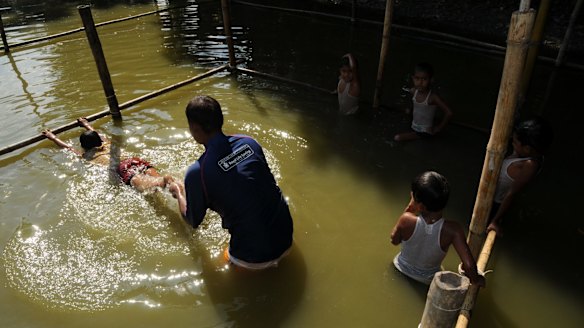 Swimming lessons in Bangladesh.