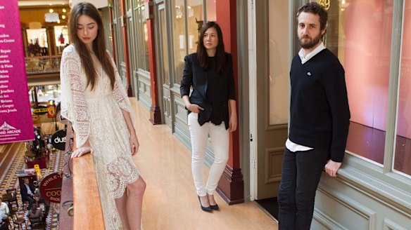 Lover founders Nic Briand and Susien Chong with model Phillpa Gleeson outside their shop at The Strand arcade. The brand has entered voluntary administration.